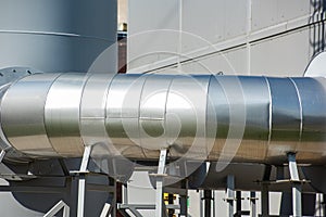 Modern industrial pipes made of bright metal