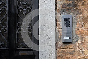 Modern Intercom Panel on Brick Wall