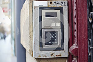 Modern intercon device with hand writte nnumbers and white blank card