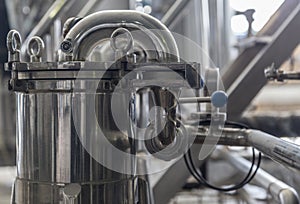 Modern interior of a brewery mash vats metal pipes