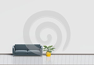 Modern interior design of living room with black sofa with white and wooden glossy floor and plant pot. Home and Living concept.