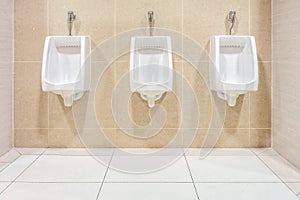 Modern interior design of white ceramic urinals