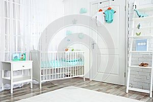 Modern interior of light cozy baby room