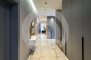 Modern interior of luxury private house. Grey tones. Entrance hall