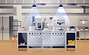 Modern interior of professional cafe or restaurant kitchen with kitchenware and equipment cooking culinary concept flat