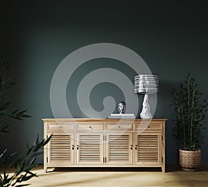 Modern interior with wooden sideboard and plants on green wall background