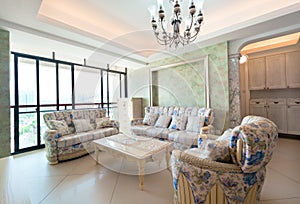 Modern interiors with sofa and table