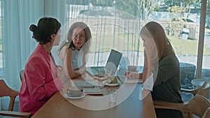 Modern international office. Women's business meetup.