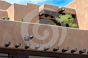 A modern interpretation of traditional pueblo-style architecture near the Plaza in Santa Fe, New Mexico, USA