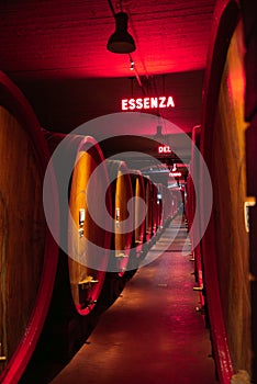 Modern Italian winery in the Region of Lombardy, Italy. Wine cellar and wooden barrel