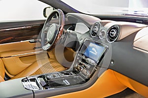 Jaguar XJ car steering wheel closeup in Kiev, Ukraine.