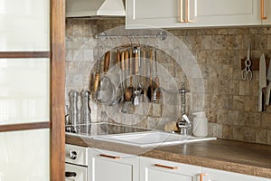 Modern Japandi kitchen interior design apartment in earth tones, natural textures with wooden solid oak furniture