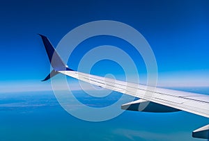Modern Jet Aircraft Winglets with a Blue Sky Background
