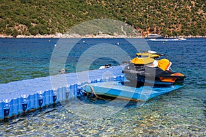 Modern jetski moored on the beautiful Antisamos beach of Kefalonia island, Ionian sea, Greece.