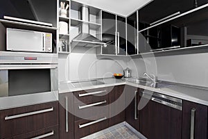 Modern kitchen in black and wenge colors