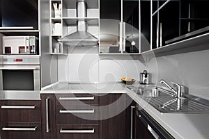 Modern kitchen in black and wenge colors