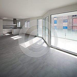 Empty modern apartment, empty spaces and white walls photo