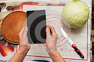 Modern kitchen. Cooking by browsing recipes on your tablet