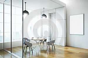 Modern kitchen dining area with poster