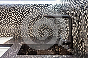 Modern kitchen furniture. Sink from a natural stone