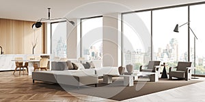 Modern kitchen interior with couch and table with chairs, relax area and window