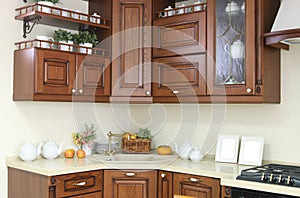 Modern kitchen interior with white and brown decoration