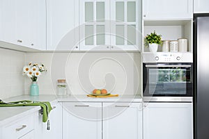 Modern kitchen interior with white furniture