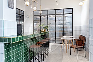 Modern kitchen with large green bar