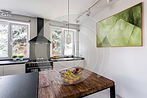 Modern kitchen with massive wooden table