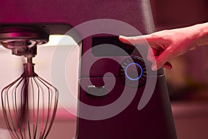 The Modern Kitchen Mixer Control Panel is currently in use for preparation and cooking activities