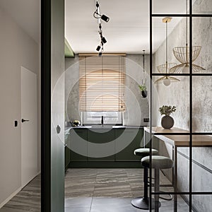 Modern kitchen with reinforced glass wall