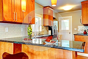Modern kitchen room interio with decorated granite counter top