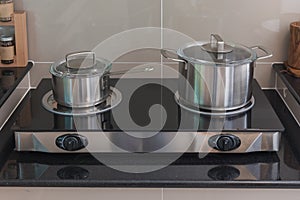 modern kitchen room with pot and pan