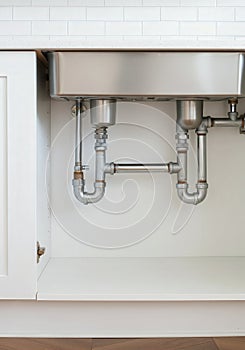 Modern kitchen sink plumbing system installation