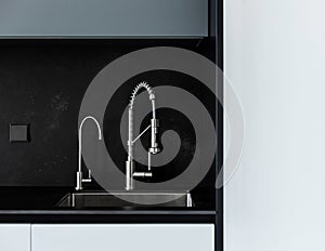 Modern kitchen washbasin with chrome faucet