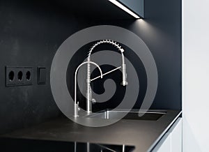 Modern kitchen washbasin with chrome faucet