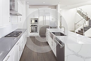 Modern Kitchen with White Cabinets and Stainless Appliances