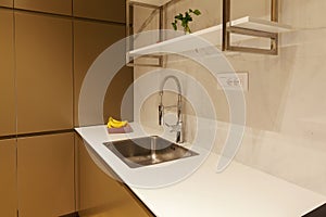 Modern kitchen with white worktop