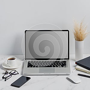 Modern lap top template mock up on white and clean work desk with blank screen Workspace desk, laptop, coffee cup and pen. laptop