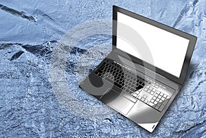 Modern laptop closeup on metallic silver material background