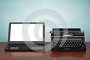 Modern Laptop Computer with Antique Typewriter. 3d Rendering