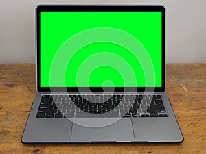 Modern Laptop Computer with Green Screen