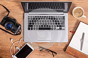 Modern laptop and everyday accessories photo