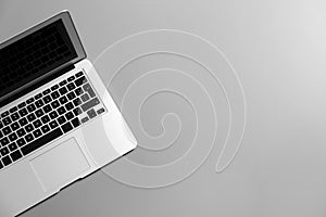 Modern laptop on gray background