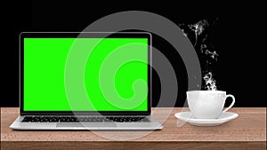 modern laptop with a green chromakey screen