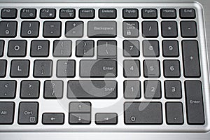 Modern laptop keyboard closeup