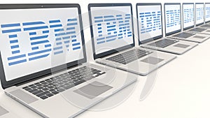Modern laptops with IBM logo. Computer technology conceptual editorial 3D rendering