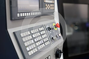 Modern lathe machine with CNC control panel