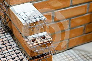 Modern layout of the construction of walls with brick masonry. External wall insulation systems