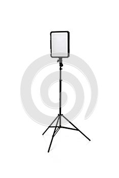 Modern LED lamp with the ability to change the color of light on a tripod stand. Isolate on a white background.